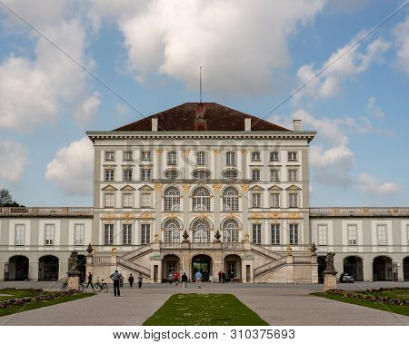 Munich, Bavaria, Germany - May 23, 2019.  Tourists Outisde Of The Nymphenburg  Palace On A Beautiful