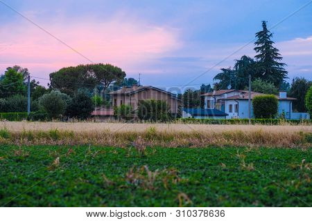 Rovigo, Italy - July, 2, 2019: landscape with the image of Rovigo at sunset