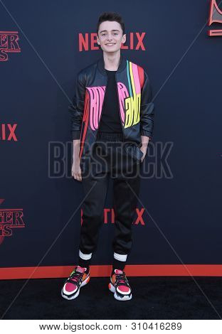 LOS ANGELES - JUN 28:  Noah Schnapp arrives for the Netflix 'Stranger Things' Season 3 Premiere on June 28, 2019 in Santa Monica, CA                