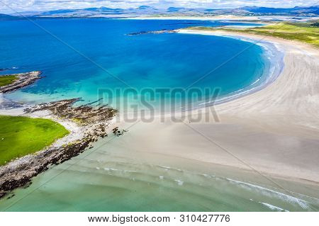 Aerial View Of The Awarded Narin Beach By Portnoo And Inishkeel Island In County Donegal, Ireland