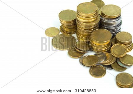 Gold Towers Made Out Of Gold And Silvery Coins, Stack Isolated On White.