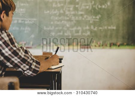 Educational Process. Young People Studying In University Sitting In Auditorium During Lecture Educat