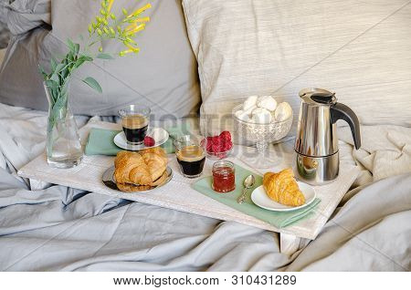 Romantic Breakfast  Or Brunch For Two In Bed. Coffee Maker  And Coffee Glasses, Croissants, Jam, Ber