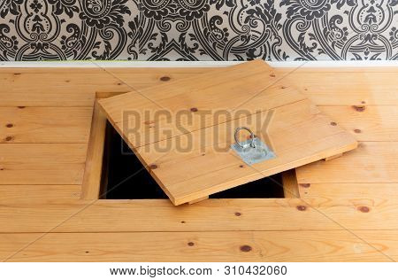 Wooden Square Old Hatchway In The Cellar In The Floor Of Wooden Planks