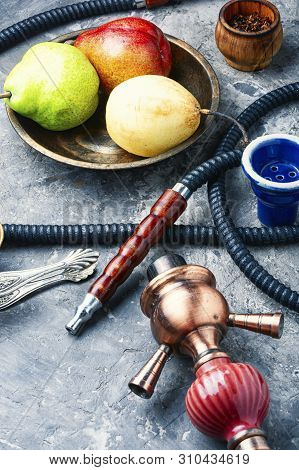 Smoking Arab Hookah With Pear