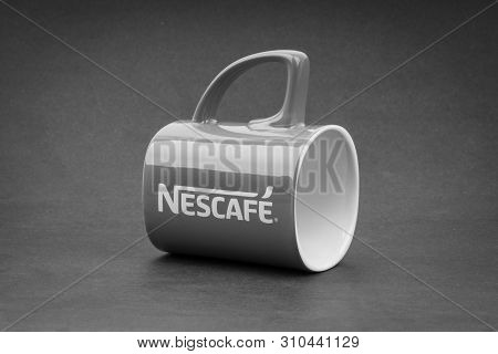 Kuala Lumpur, Malaysia - July 03, 2019; Promotional Red Nescafe Mug On Black And White.  Selective F