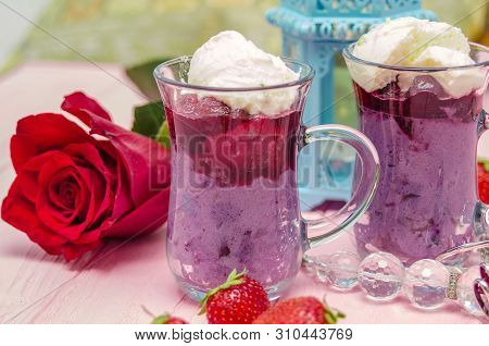 Mahalabia - Traditional Middle Eastern Dessert. Creamy Dessert With Berries And Yogurt Cream. Arabic