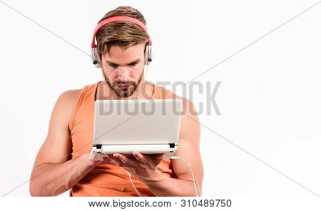 Free Online Music Sources. Cyber Monday Concept. Sexy Muscular Man Listen Audio. Man In Earphones Is