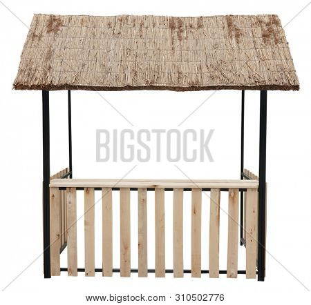 Wooden market stand stall with thatched reed roof awning