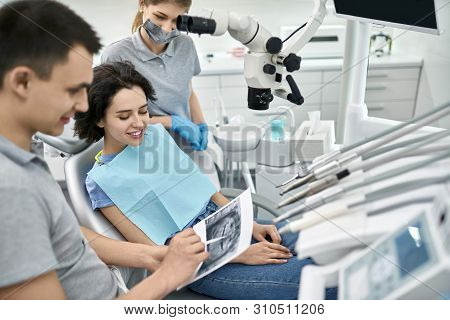 Pretty Womans Teeth Treatment In Dental Clinic