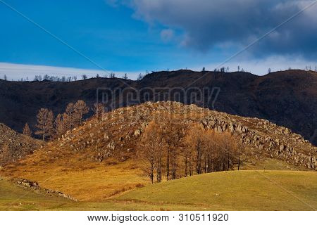 Russia. Mountain Altai. The Surrounding Mountains Regional Center Onguday Along Tchuisky Highway.