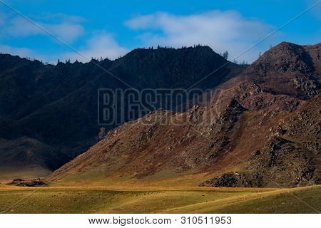 Russia. Mountain Altai. The Surrounding Mountains Regional Center Onguday Along Tchuisky Highway.