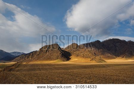 Russia. Mountain Altai. The Surrounding Mountains Regional Center Onguday Along Tchuisky Highway.