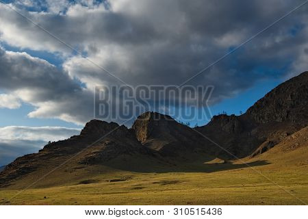 Russia. Mountain Altai. The Surrounding Mountains Regional Center Onguday Along Tchuisky Highway.