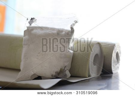 The Glue In The Package And A Roll Of Paper, Object