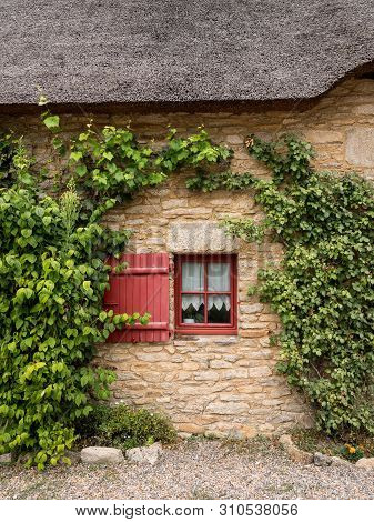 Old House In Saint Lyphard (france) With A Thatched Roof