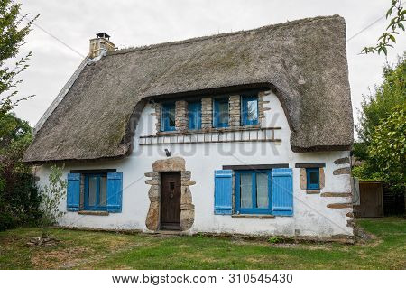 Old House In Saint Lyphard (france) With A Thatched Roof