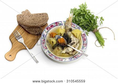 Ready Meals. Fish Soup In A Plate From Grouper (epinephelus Aeneus) On A White Background Close-up