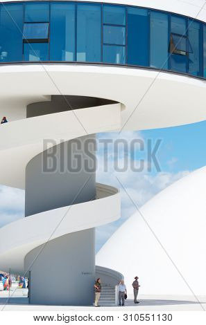 Aviles, Spain - August 10, 2011: tourists visiting building known as 
