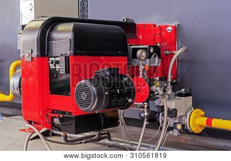 Gas Equipment At The Modern Boiler Room. Gas Burner With Modulating Control For The Combustion Of Ga