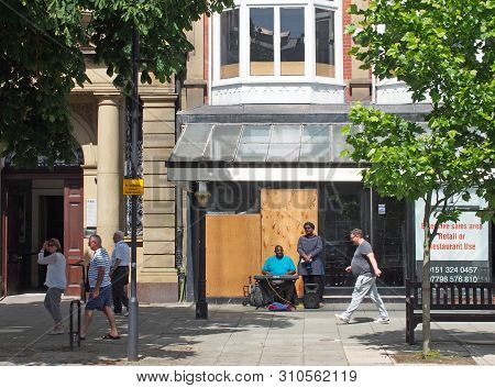 Southport, Merseyside, United Kingdom - 28 June 2019: A Man And Woman Playing The Organ And Singing 