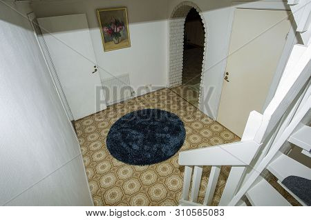 View Of White Stair Leading To Basement With White Walls. Typical Scandinavian Interior. Flen. Swede
