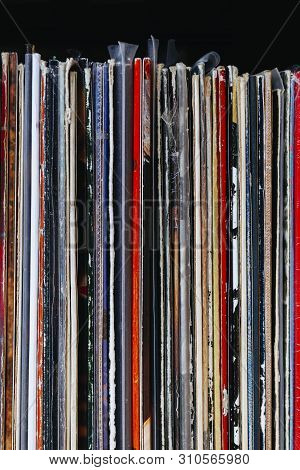 Vinyl Record Collection. Stack Of Old Vinyl Records. Сloseup.