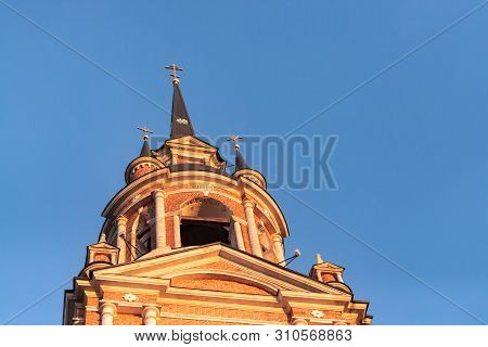 Gothic Orthodox Cathedral. Neo-gothic Orthodox Church With Masonic Symbols. Church Spire Against Blu
