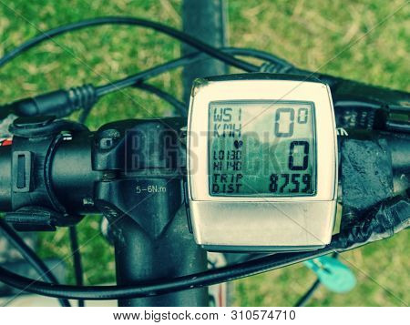 Closeup Of Professional Mtb Handlebars With Cycling Computer In Front.