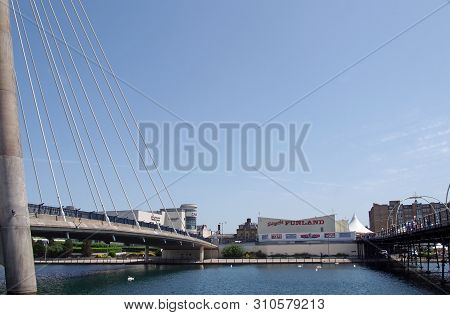 Southport, Merseyside, United Kingdom - 28 June 2019: A View Between The Suspension Bridge And Pier 