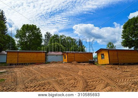 Construction Of Small Yellow Wooden Frame Prefabricated Pre-fabricated Eco-house Of Suburban Modular