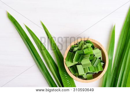 Sliced Pandan Leaf In A Bowl And Fresh Pandan Leaf On White Background, Pandan Leaf Used To Enhance 