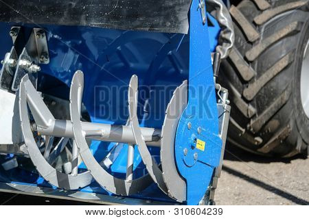 Image of a part of snow-removal mini tractor