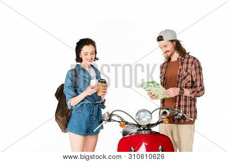 Girl Looking At Smartphone And Holding Paper Cup Of Coffee And Young Man Looking At Map, Satnding Ne