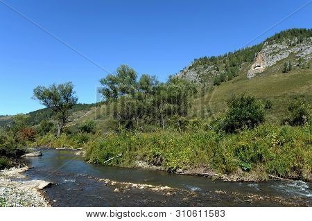 The Mountain River Yarovka On The Territory Of The Altai Territory In Western Siberia. Russia