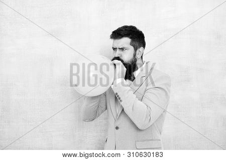 Man Inflating A Blue Balloon. Bearded Man With Balloon. Happy Birthday. Preparation To Party, Celebr
