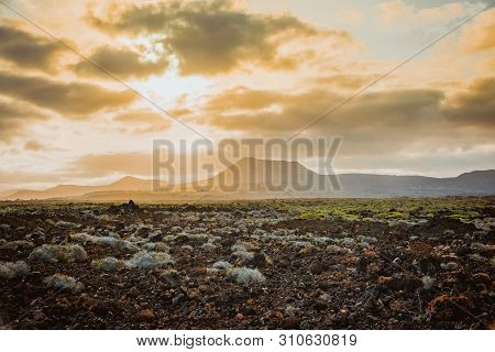 Beautiful Mountain Landscape With Volcanoes At Sunset In Timanfaya National Park In Lanzarote, Canar