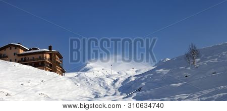 Panoramic View On Snowy Off-piste Slope And Hotel In Winter Mountains. Caucasus Mountains, Georgia, 