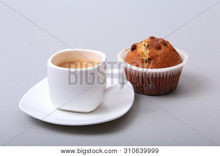 Classic Espresso In White Cup With Homemade Cake And Chocolate On White Background.