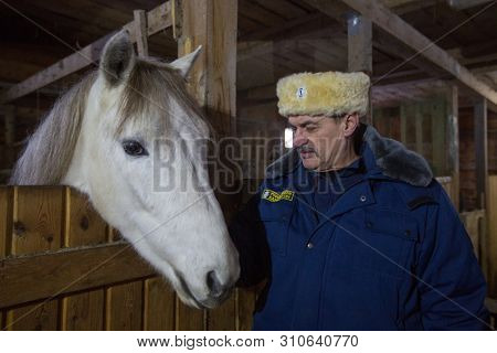 PODPOROZHYE, RUSSIA - JAN 21, 2018: Training riding in the framework of revival program of the Cossacks in the Leningrad region. Cossacks in St.Petersburg began its revival in 1990.