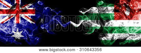 Australia Vs Abkhazia, Abkhazian Smoky Mystic Flags Placed Side By Side. Thick Colored Silky Smokes 