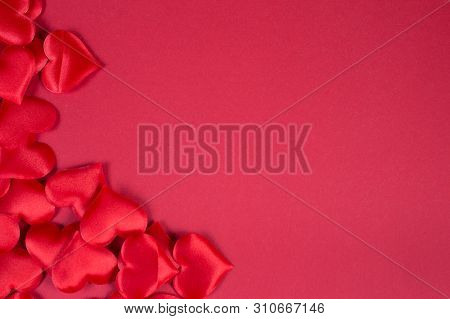 Flatlay In A Romantic Style With Red Hearts On Red Background