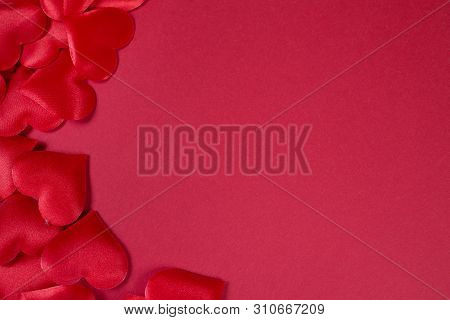 Flatlay In A Romantic Style With Red Hearts On Red Background
