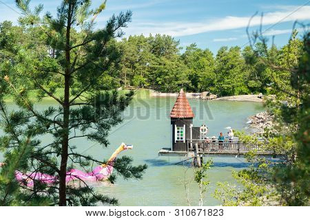 Naantali, Finland - 28 June, 2019: Bathing Hut And Edvard The Booble In Park Moominworld At Sunny Su