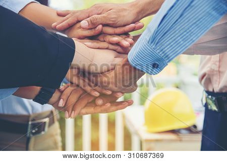 Close Up Hands Of Team Work Collaborator Work In Construction. Team Engineering Meeting Conference.