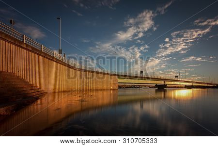 Sunset And High Tide At The Bridge Over The Loughor Estuary Linking Swansea To Llanelli In South Wal