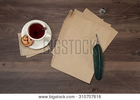 Cup Of Black Tea On Wooden Table
