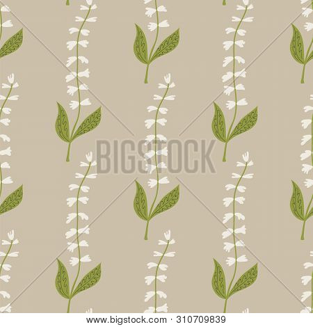 Seamless Pattern Of White Tinkerbell Flowers On A Beige Background.
