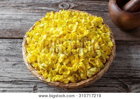 Fresh Denseflower Mullein Flowers In A Basket On A Wooden Table