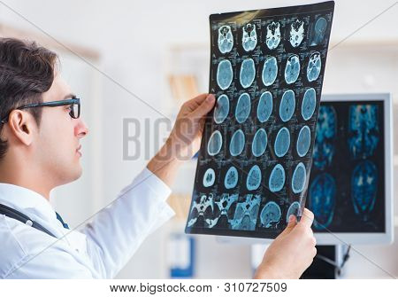 Doctor radiologist looking at x-ray images